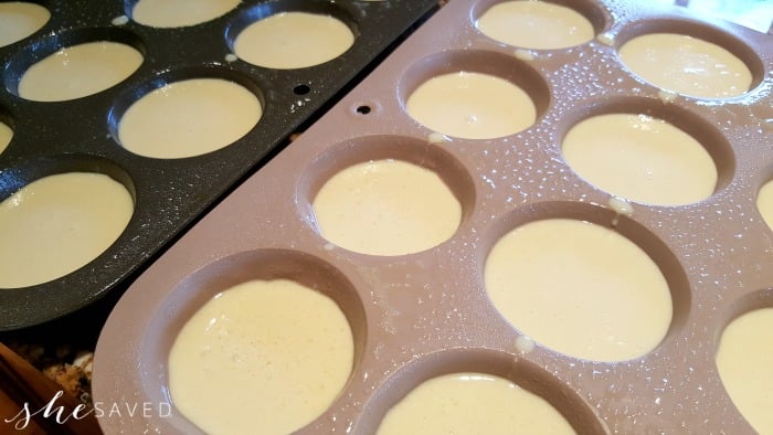 Popover batter in muffin tins getting ready to go in the oven