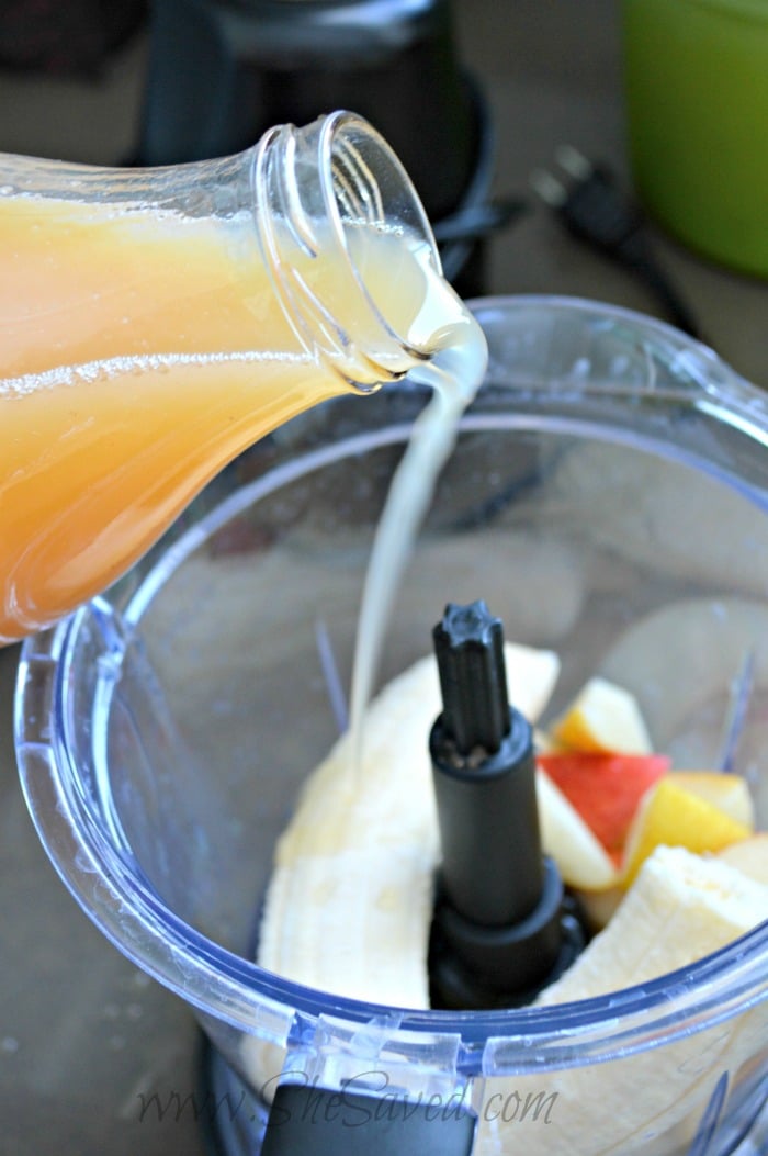 Pouring Juice Into Smoothie