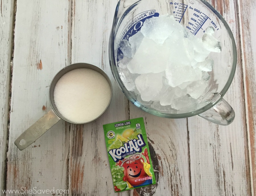 Quick and easy this Kool-Aid Lime Slushie Recipe is perfect for summer refreshments!