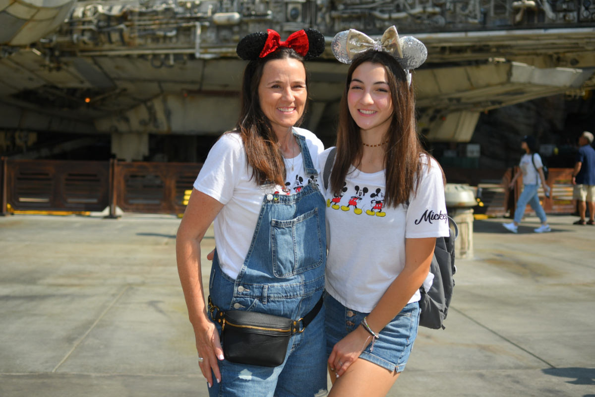 Mom and daughter at Disneyland in Star Wars Land in Mickey Mouse Ears