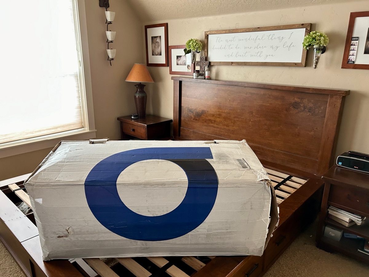 Amerisleep Organica mattress in shipping box on bed