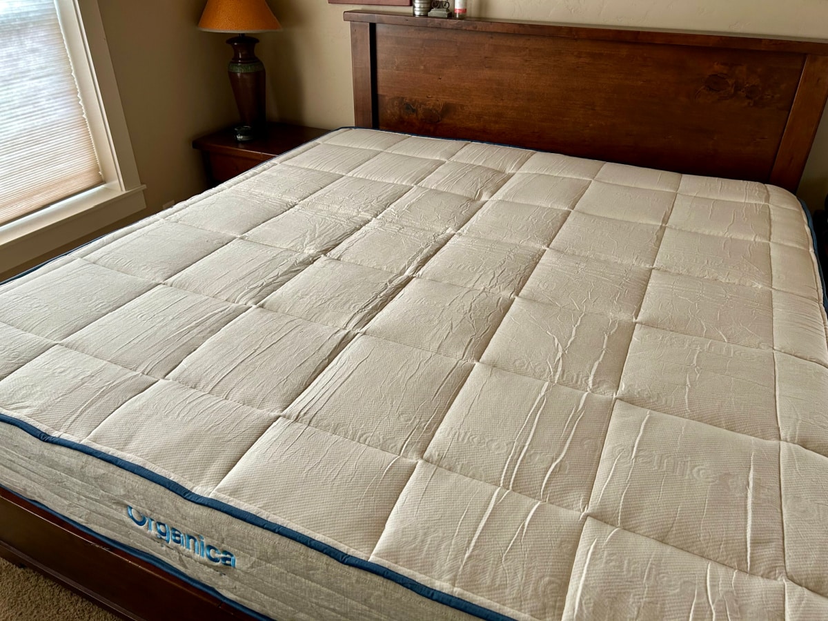 top view of an Amerisleep mattress on a wooden bed frame
