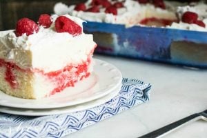 EASY Raspberry Cheesecake Poke Cake Recipe