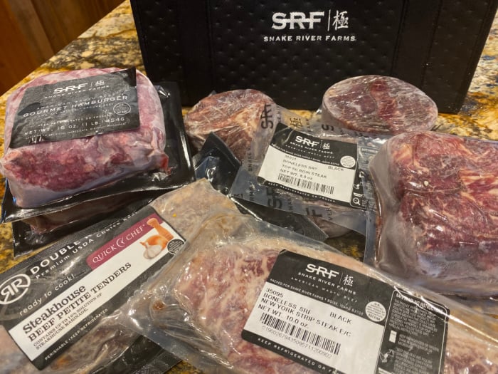 Several Frozen Snake River Farms Meat Products