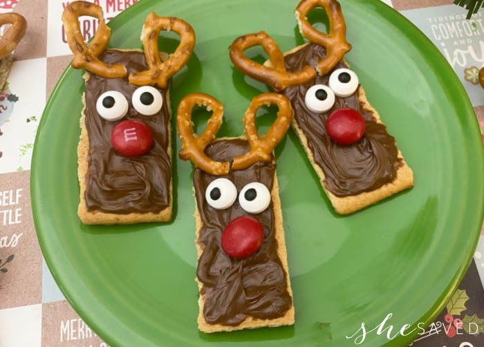 3 reindeer crackers on a green plate