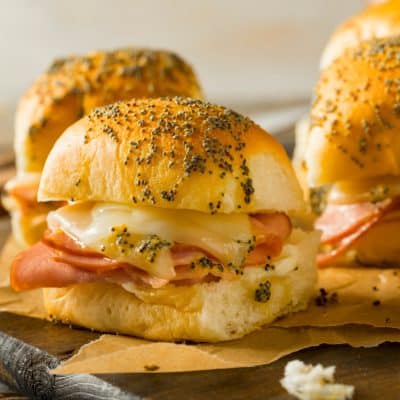 Hawaiian dinner rolls with melted cheese and ham