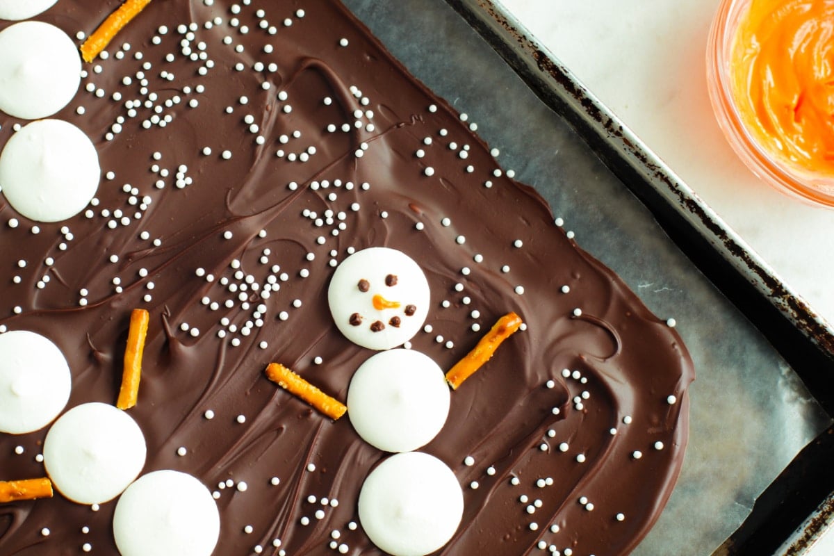 snowman painted face on melted chocolate bark